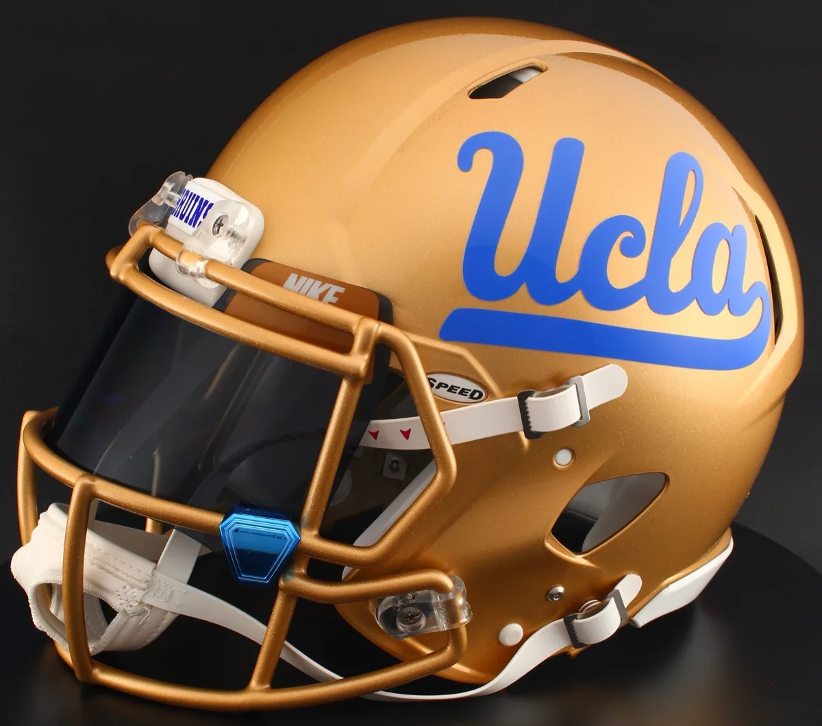 UCLA Bruins Riddell Authentic Speed Football Helmet – Gold Script UCLA, Gold Factory Mask, Black Visor, Old Gold Brow Tabs, and Blue Chrome Clips