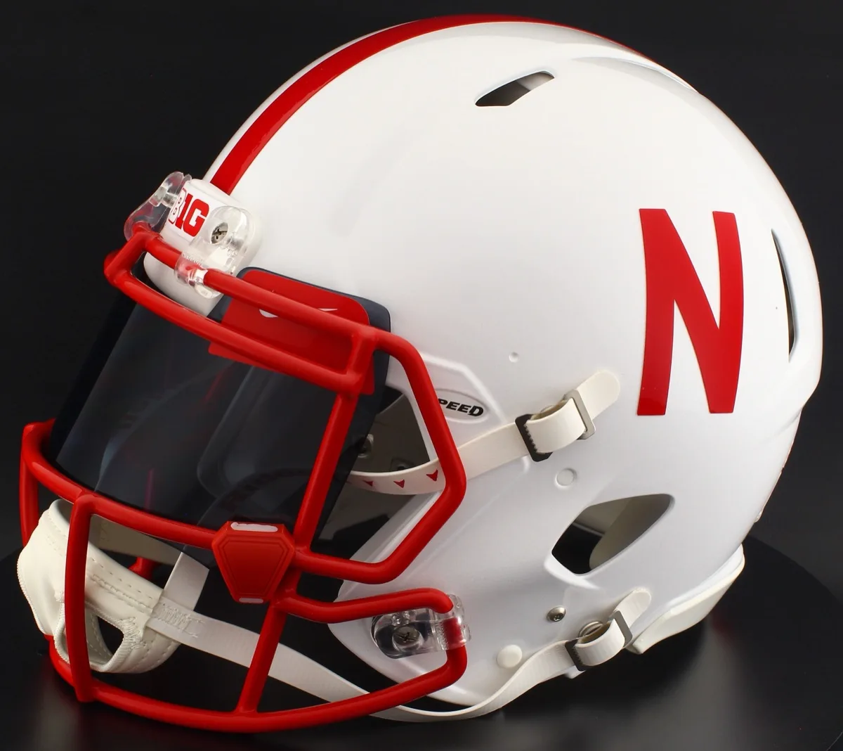 Nebraska Cornhuskers Riddell Authentic Speed Football Helmet – White Metallic, Red Factory Mask, Black Visor, Red Brow Tabs, and Red Clips