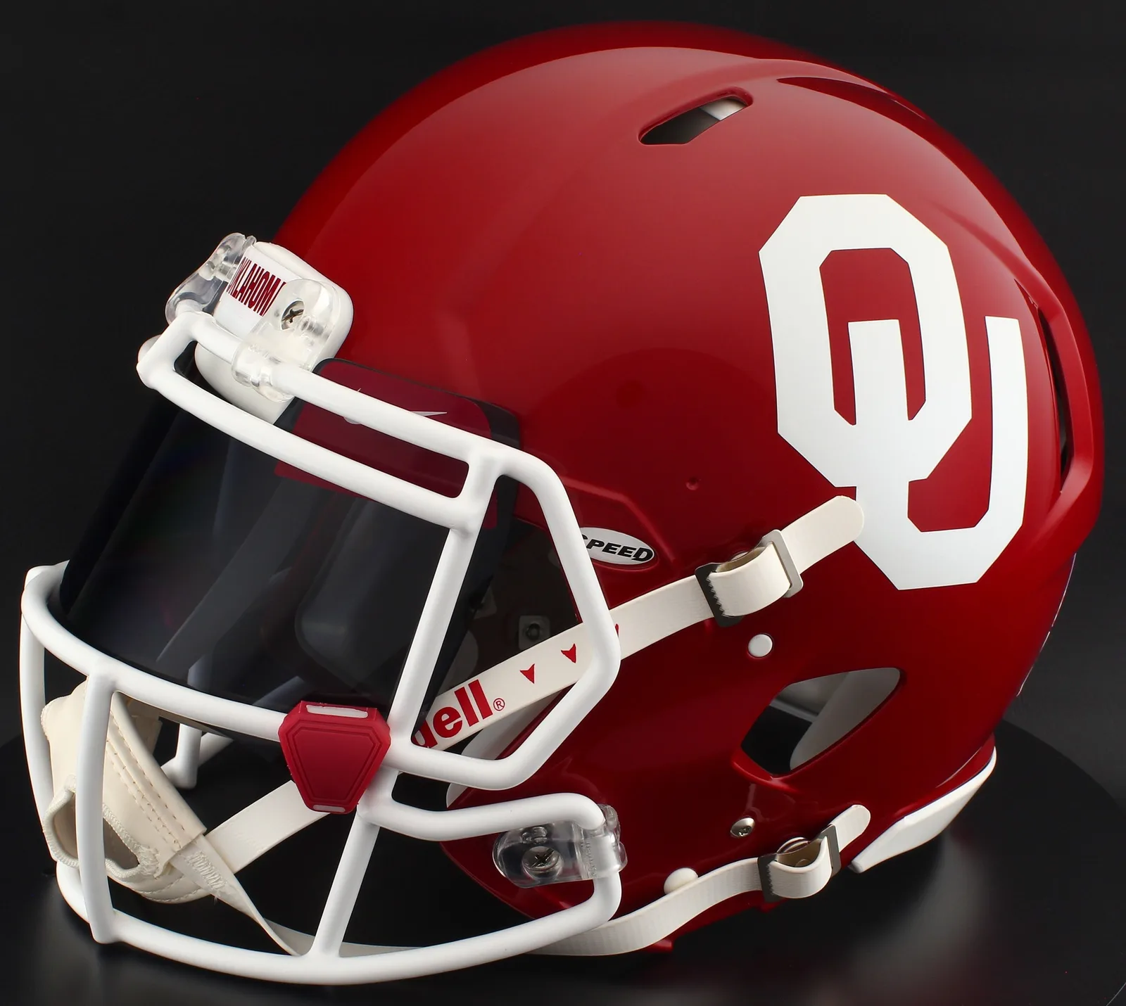 Oklahoma Sooners Riddell Authentic Speed Football Helmet – Crimson OU, White Factory Mask, Black Visor, Cardinal Brow Tabs, and Cardinal Clips