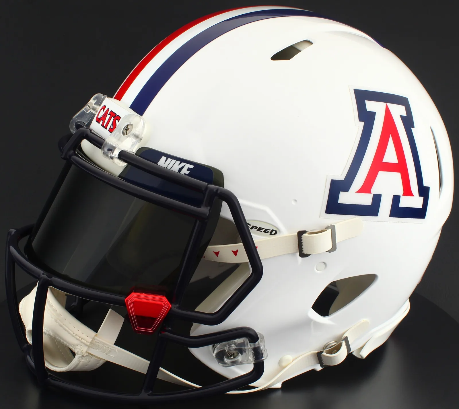 Arizona Wildcats Riddell Authentic Speed Football Helmet – Gloss White, Navy Blue Factory Mask, Nike Black Visor, Navy Blue Brow Tabs, and Red Chrome Clips