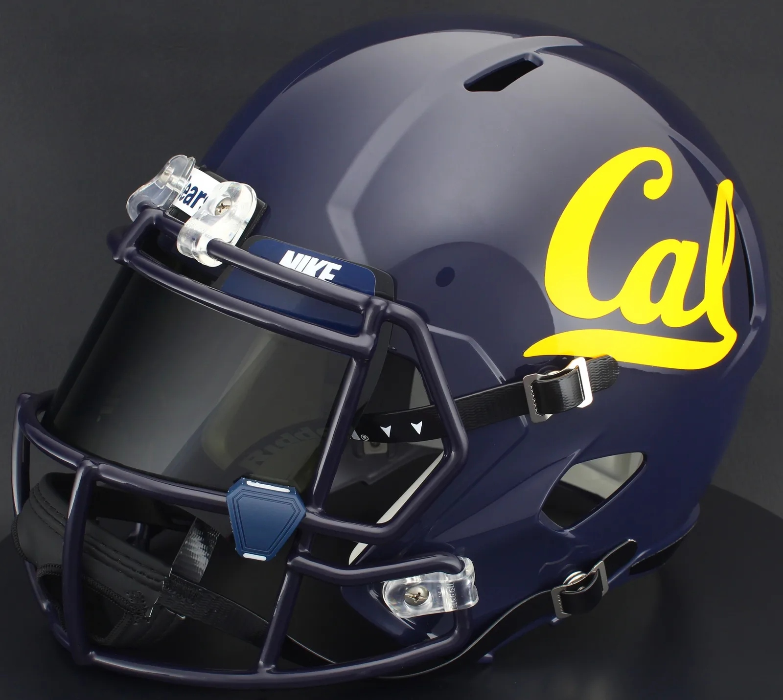California Golden Bears Riddell Replica Speed Football Helmet – Navy Script Cal, Navy Blue Factory Mask, Nike Black Visor, Navy Blue Brow Tabs, and Navy Blue Clips